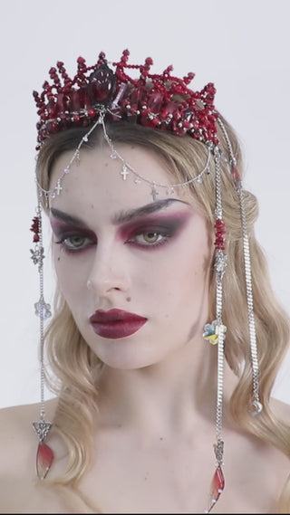 Punk Rave WS-784 Gothic red jeweled crown with gemstone centerpiece and silver chain drapes, shown in motion on model.