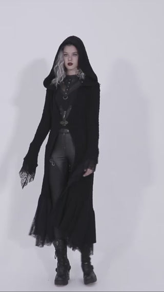 Model wearing the Punk Rave WM-047 hooded coat turns to show all sides, walking slowly to reveal the garment's flowy movement, textured fabric, lace trim, and long, layered hemline.