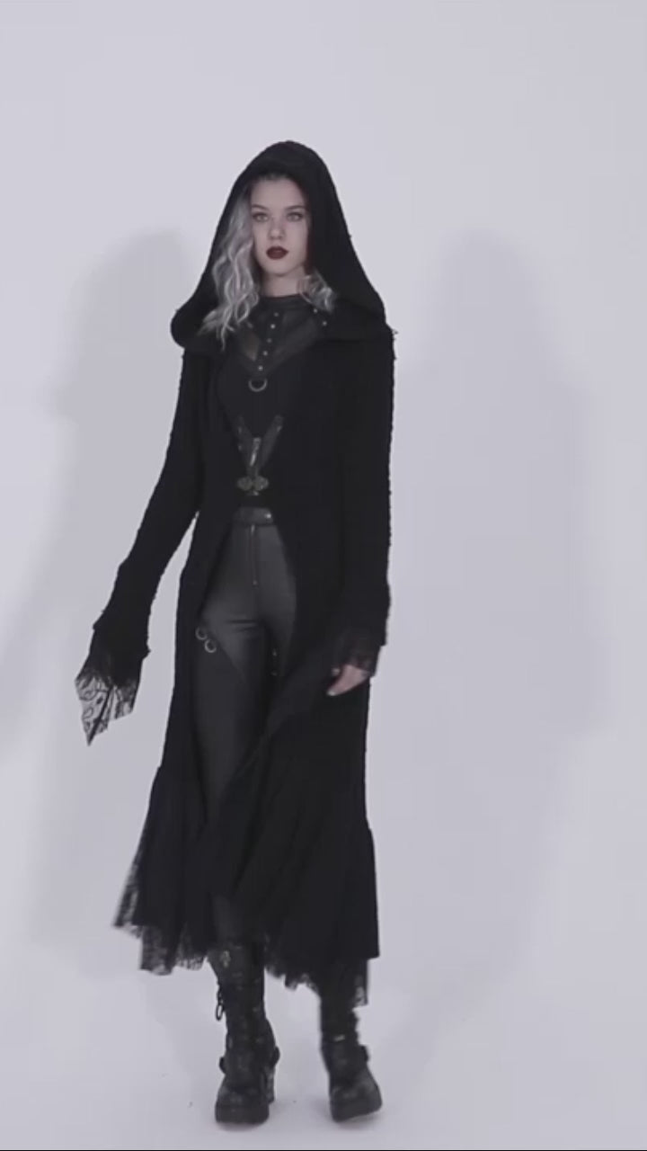 Model wearing the Punk Rave WM-047 hooded coat turns to show all sides, walking slowly to reveal the garment's flowy movement, textured fabric, lace trim, and long, layered hemline.