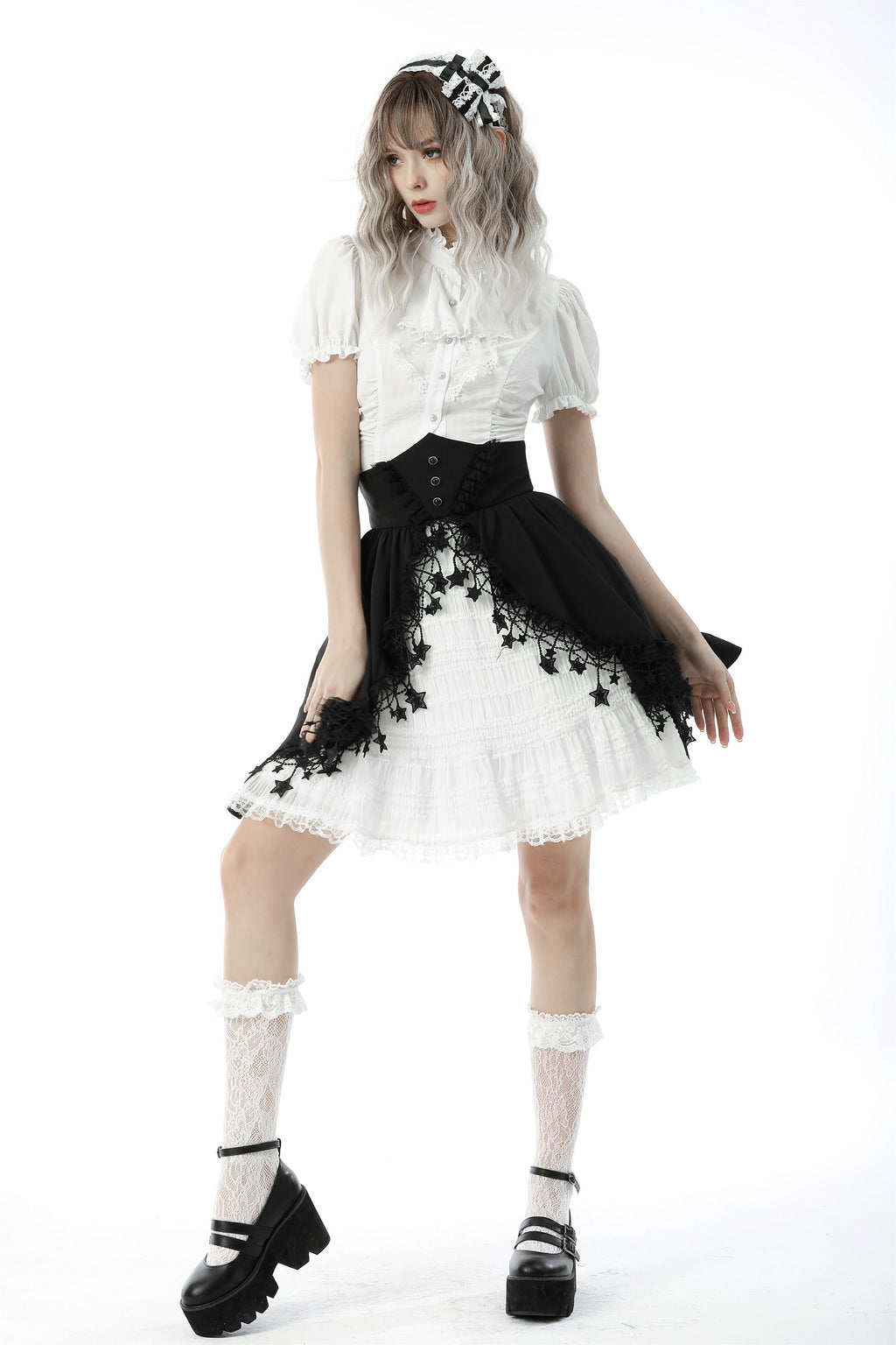 Model wearing dark in love iw087 white Gothic victorian blouse with puff sleeves and lace collar, moving slightly to show fit and fabric detail.