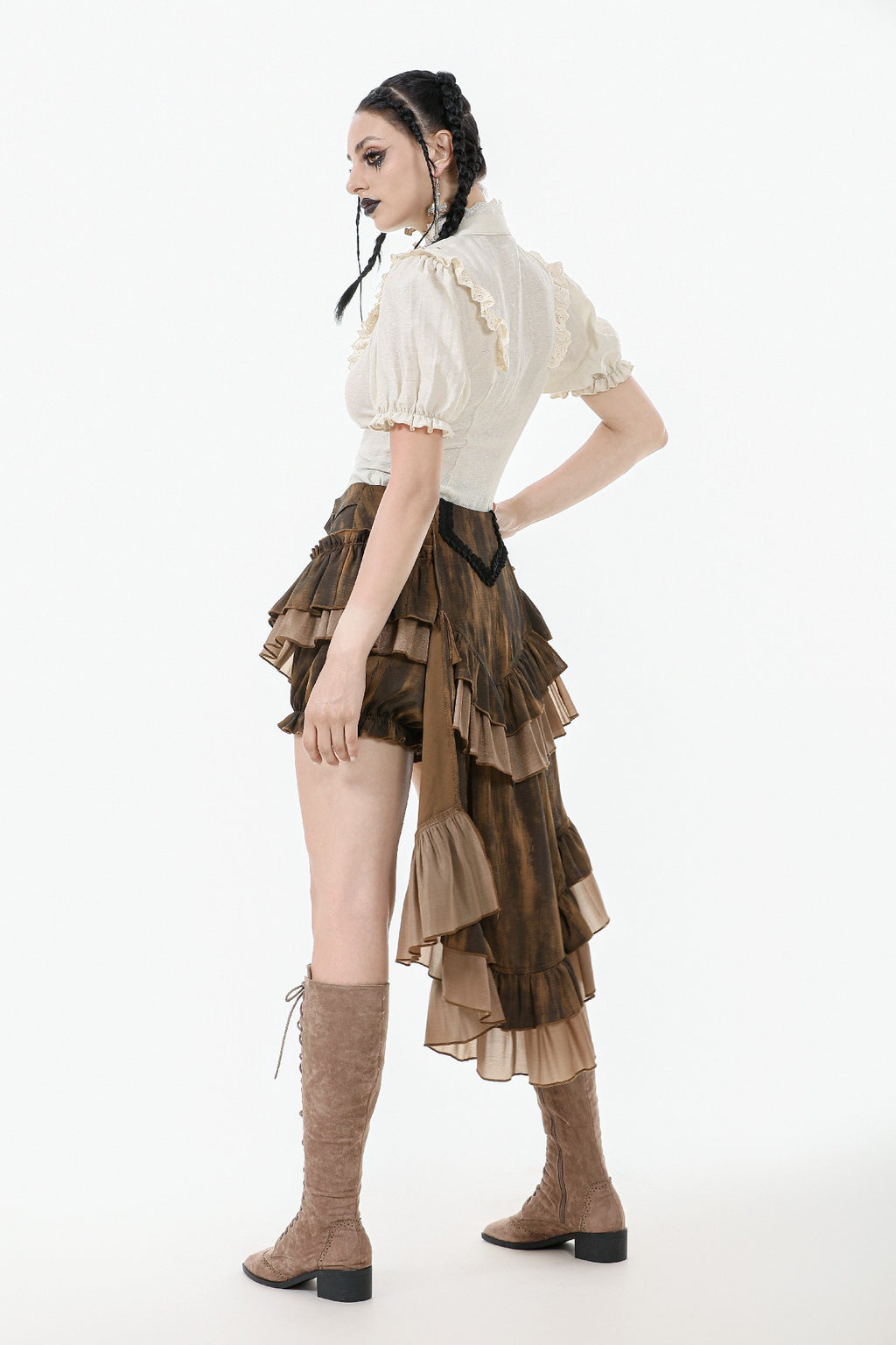 Model twirls and walks in brown tiered Steampunk tail skirt, showing high-low hem, ruffles, and movement from multiple angles