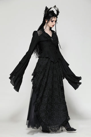 Woman wearing dark in love tw-624 a black Gothic Victorian top with flared bell sleeves, lace accents, and layered hem, styled with a matching long skirt and headpiece