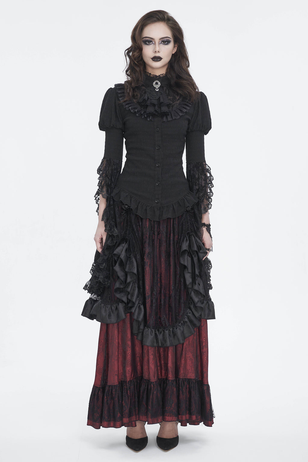 Model showcasing devil fashion sht113 a black Gothic Victorian blouse with lace Juliet sleeves, frilly jabot neckline, and button-up front on white background.