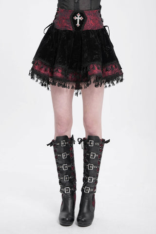 Video of Devil Fashion SKT23002 Baroness Bloodrose Mini Skirt highlighting red jacquard rose waistband, jeweled cross centerpiece, black velvet flare, and lace-trimmed hem in motion.