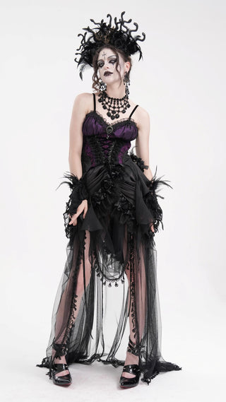 Close-up of a black Medusa-inspired headpiece with coiled serpent designs and ornate detailing, showcased against a white background.