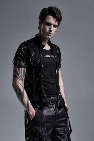 Male model showcases the Punk Rave WY-1287 sleeveless vest with exposed chest, decorative chains, and textured black fabric. He moves to reveal the garment's chain drape, fitted structure, and bold Gothic aesthetic from different angles