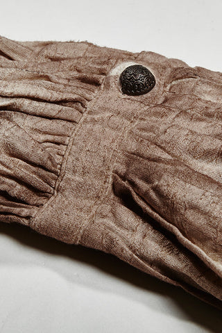Close-up of cuff on Punk Rave Drowned Mariner Shirt showing gathered sleeve and embossed metal button