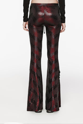 Back view of Punk Rave WK-619 women’s Gothic red flared trousers with black abstract pattern and lace-up leg details.