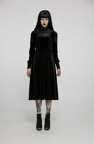 Model wearing a black Romantic Gothic velvet midi dress by Punk Rave, with long lace-appliqued sleeves and a high lace-trimmed neckline, standing against a light grey background.
