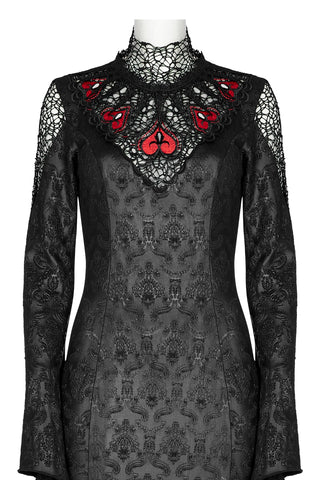 Close-up of front bodice on black Gothic dress with red heart embroidery and intricate lace collar detailing on mannequin.
