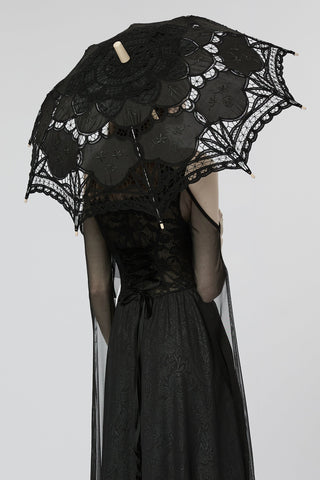 Back view of model in black Gothic dress holding the ‘punk rave ws-549’ Victorian cotton lace parasol, showing full lace canopy detail