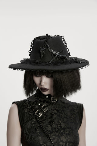Model wearing punk rave ws-821 a black Gothic hat with lace trim, chain accents, and dragon bone details on a plain background.