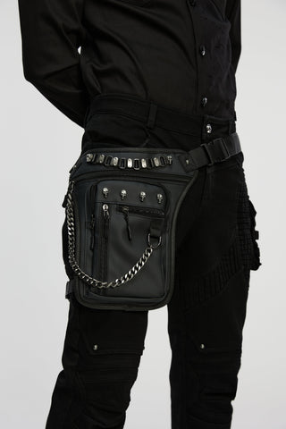 Punk Rave WS-868 men’s Gothic waist–leg festival bag with skull studs, chain detail, and multiple zip pockets, worn over black cargo pants.