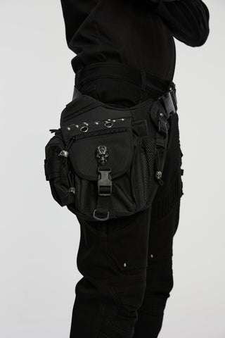 Punk Rave WS-869 men’s tactical Gothic waist–leg bag with skull buckle, worn over black pants on a white background.