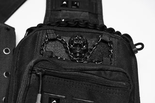 Close-up of black skull hardware and chain detail on cyber goth utility sling bag