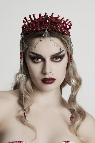 Model wearing Punk Rave WS-784 Gothic red jeweled crown with hanging silver chains and gemstone details, front view.