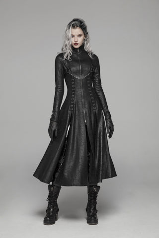 Model wearing Punk Rave WY-1065 long black Gothic coat dress with high collar, lace-up front, gloves, and platform boots, standing against grey background