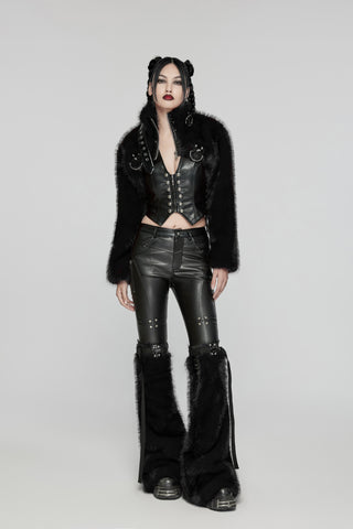 Model wearing black faux fur bolero, leather corset top, and matching high-waisted leather pants with faux fur leg accents, standing on a grey background
