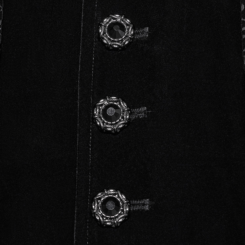 Close-up of decorative silver buttons on black velvet front panel of tailcoat