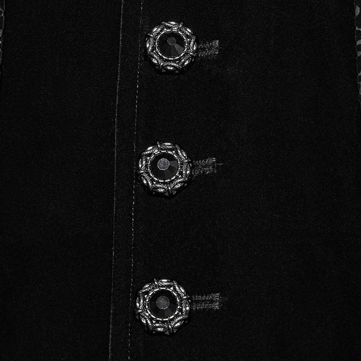Close-up of decorative silver buttons on black velvet front panel of tailcoat