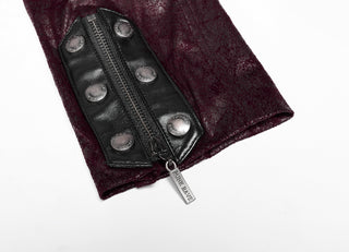 Detailed view of a sleeve cuff featuring a zipper with 'PUNK RAVE' pull tab and faux leather strap with metal snaps over burgundy jacquard fabric.