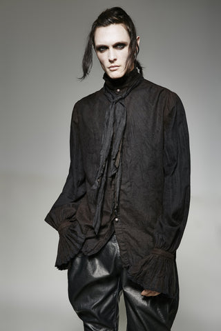 Model wearing the Punk Rave Y-714 black Gothic shirt with a high collar, neck tie and oversized ruffled cuffs