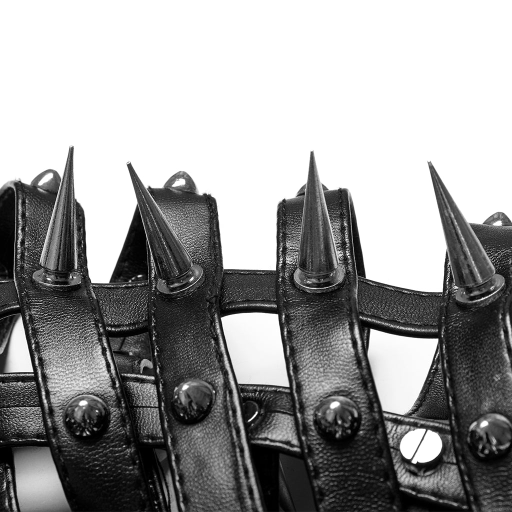 Close-up of top spikes and studding on black cage mask