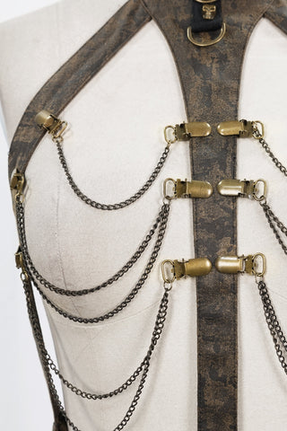 Close-up of Steampunk harness showing antique gold chains and clasp hardware