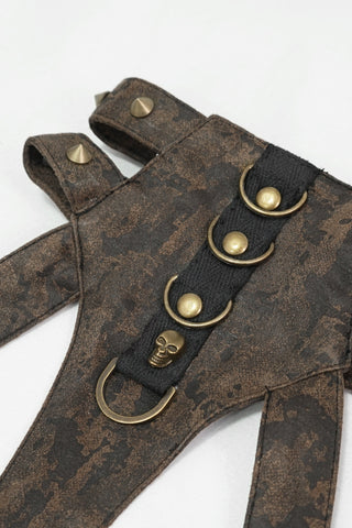 Rust-effect faux leather harness with brass D-rings and skull embellishment