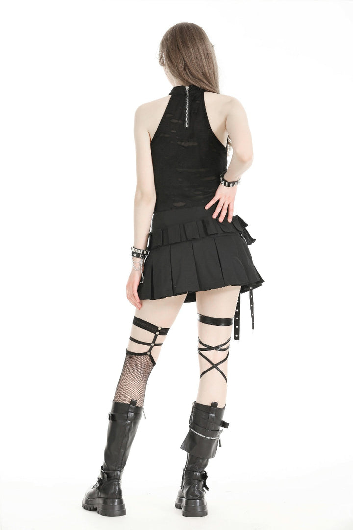 Back view of model wearing a black techwear pleated mini skirt with utility belt, hanging straps, and combat boots