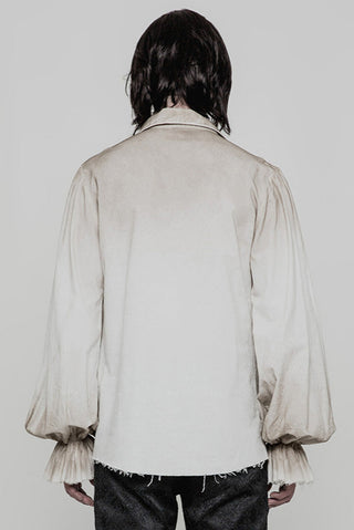 Back view of model wearing distressed white pirate-style shirt with gathered sleeves and loose fit